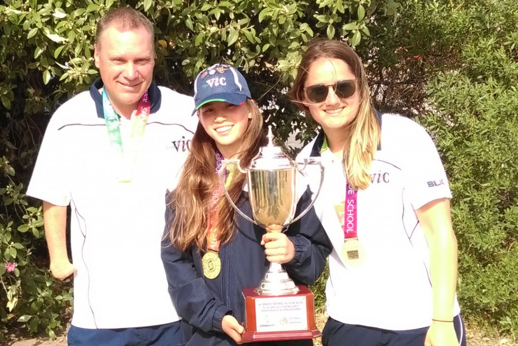Elwin Parbery with the Coach and Team Manager of the SSV Girls Under 13 Championship Team